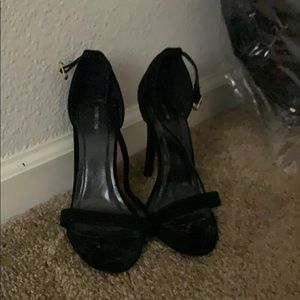 Pretty little things black heels. Never worn.